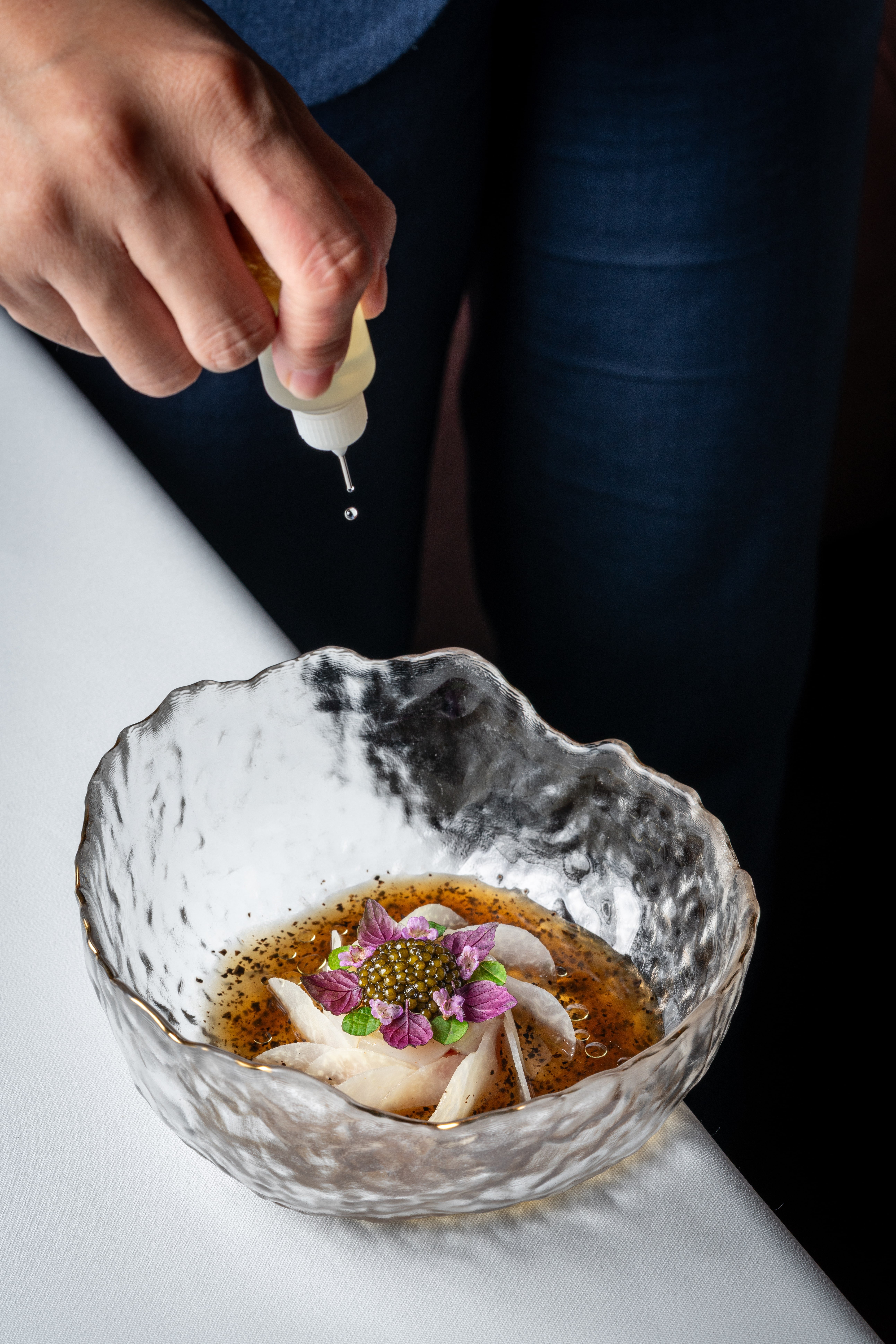 A portrait at Mia — chef at work